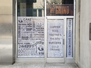 The Grind Window and Door Sign