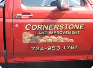 CORNERSTONE LAND IMPROVEMENTS TRUCK DOOR